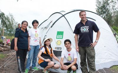 ShelterBox response volunteers with disaster relief tent in Philippines