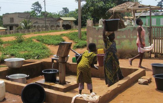 Child pumping clean water from well