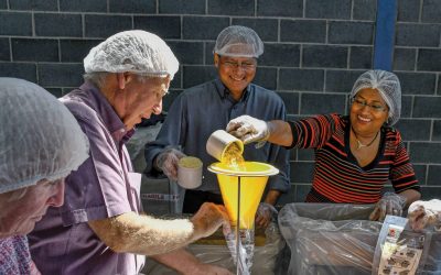 Rotary volunteers pack meals for Africa for Rise Against Hunger