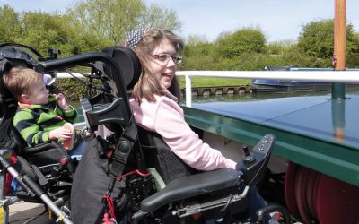 children with disabilities enjoy boat trip with the Willow Trust