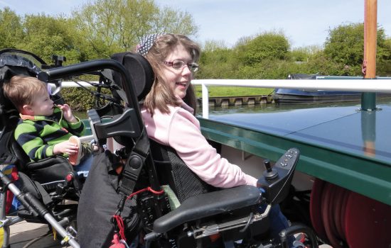 children with disabilities enjoy boat trip with the Willow Trust