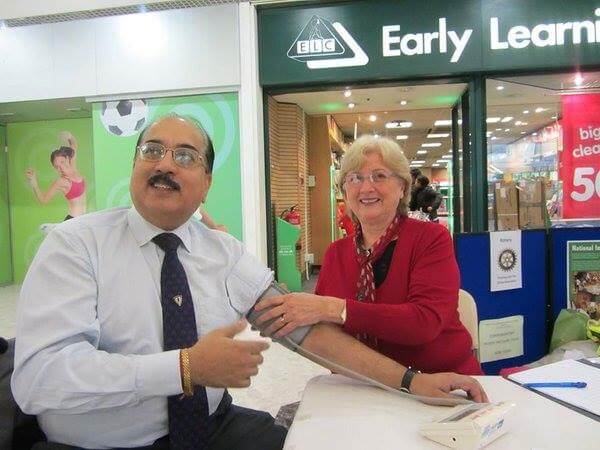 Mukesh Malhotra having blood pressure taken