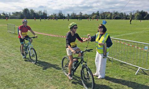 rotary cycling competition on grassy field