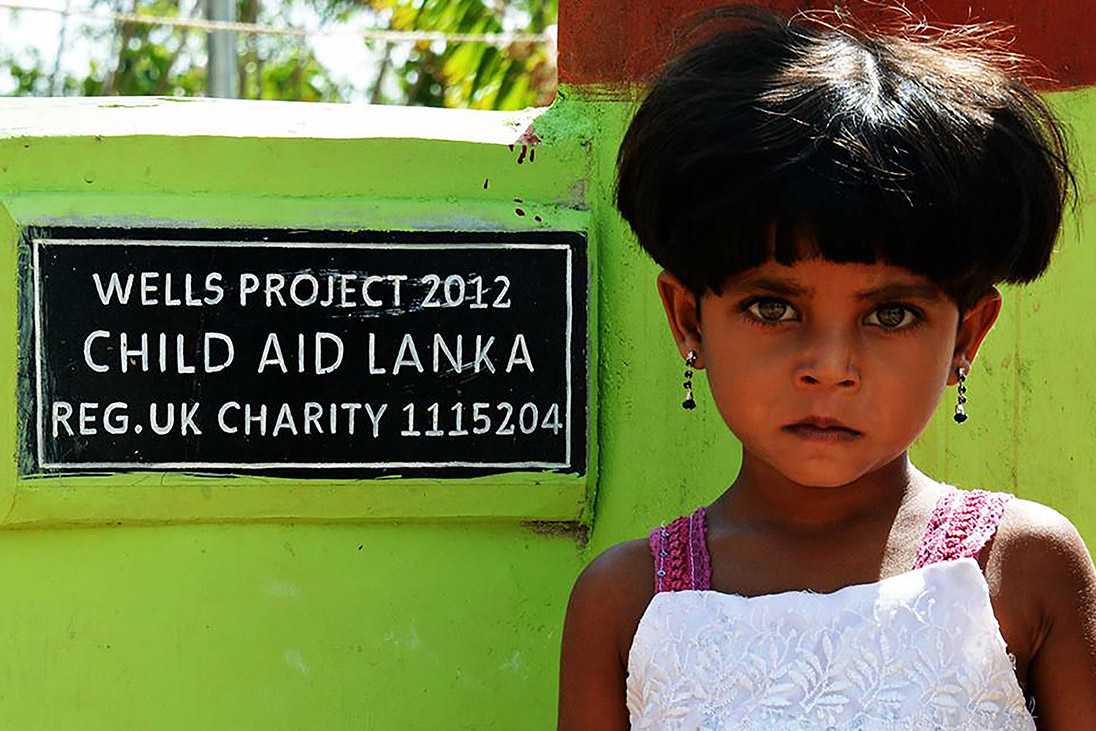 well project providing clean water child aid lanka rotary foundation