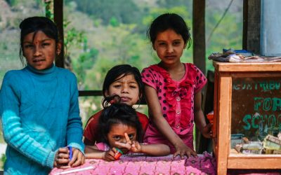 school children smiling about new education building project