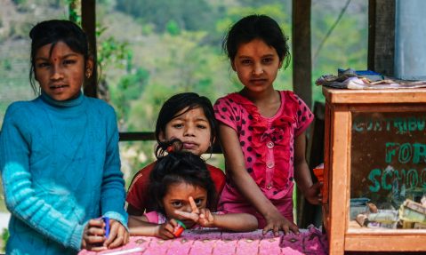 school children smiling about new education building project