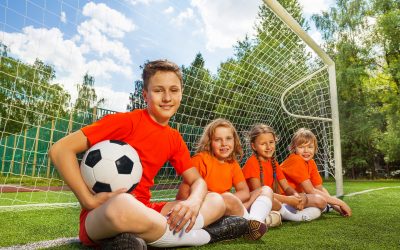 kids football playing games goal smiling