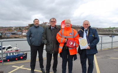 defibrillator fundraising rotary members volunteer