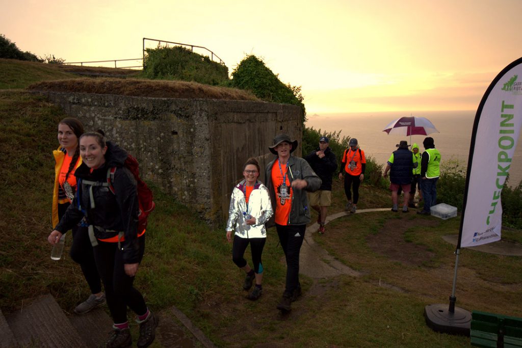 volunteers checkpoint sunset walk guernsey saffery