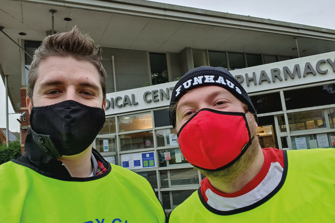 Chris (right) and fellow Rotaract Club members volunteered alongside Rotarians at a vaccination centre in Market Harborough.